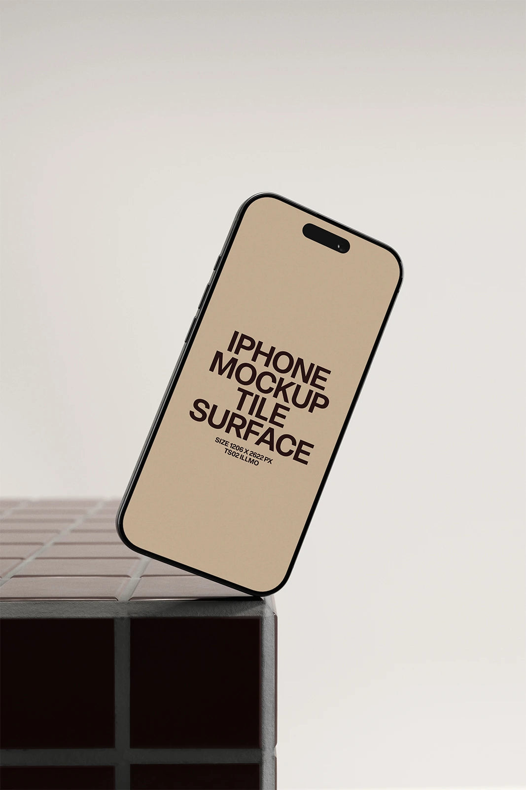 iPhone mockup on a burgundy tile table with a beige UI placeholder for web and desktop UI presentation, angled view