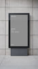 Animated vertical digital billboard mockup with a grey placeholder screen